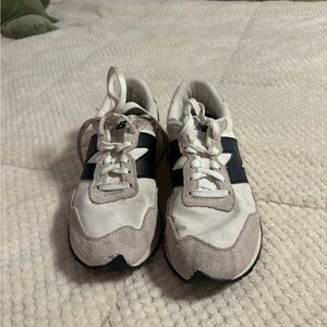 New Balance women’s  Black and White Sneakers